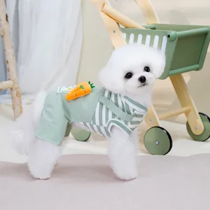 Detail of green and white striped pet jumpsuit with a cute 3D carrot ornament