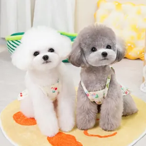Floral print pet summer dress for small dogs and cats in a cozy indoor setting