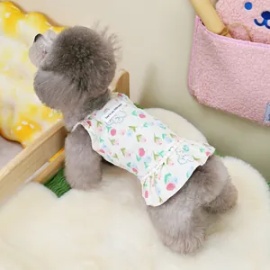 Close-up of floral pet dress with heart-shaped tulip patterns and ruffle hem detail