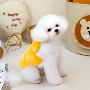 Close-up of bright yellow plush pet vest for small dogs on a white Bichon model