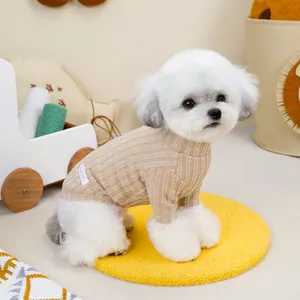 Detail of beige ribbed knit pet sweater with high collar and soft texture for small dogs