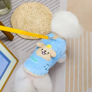 Blue coral fleece pet hoodie with cartoon embroidery and yellow leash attachment