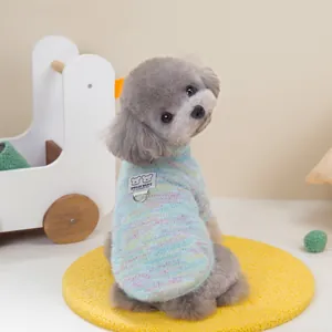 Pastel rainbow knit dog sweater with high collar and D-ring on soft blue base
