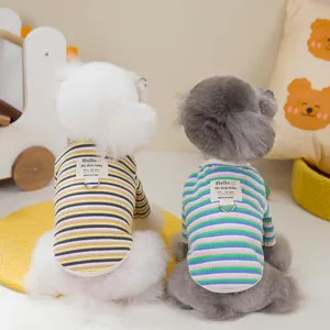 Striped dog vests in yellow and blue with metal D-rings for small pets like poodles