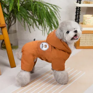 Detailed close-up of a caramel dog bodysuit featuring a cute bear embroidery and hood