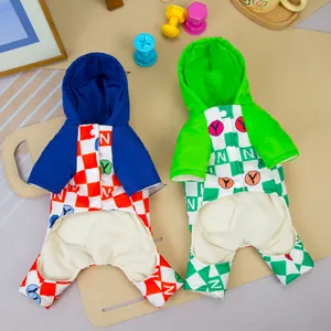 Detail of warm checkered pet hoodies with soft fleece lining and snap buttons