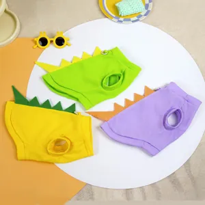 Three dinosaur-themed pet vests with waffle texture and D-rings for small dogs and cats