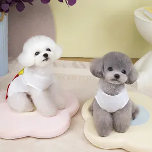 Minimalist white cotton pet vest for small dogs and cats in a cozy indoor setting