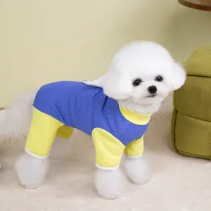Close-up of blue and yellow ribbed pet onesie with cute white angel wings on the back