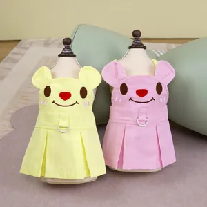 Cute embroidered bear pet dresses in pink and yellow with pleated skirts and D-rings