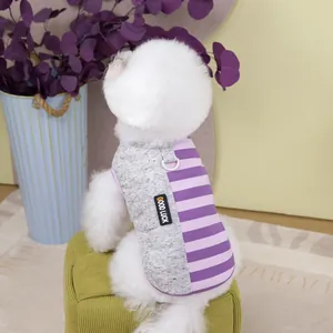 Detail view of purple striped pet vest with metal D-ring and Good Luck label