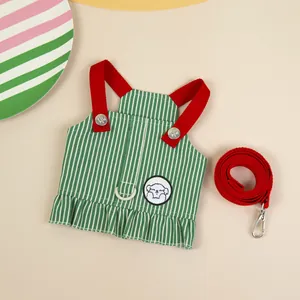 Green and white striped pet harness vest set with red leash and cartoon puppy patch