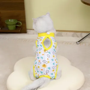 Detailed back view of cat recovery suit with sun and cloud prints and snap buttons