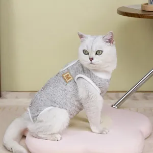 Detail view of grey cotton cat recovery suit with side snaps and M size label