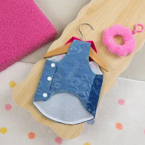 Blue denim pet vest with cartoon print and breathable mesh lining for small dogs and cats