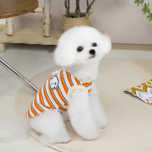 Close-up of orange, white, and blue striped knit pet vest with cartoon puppy patch