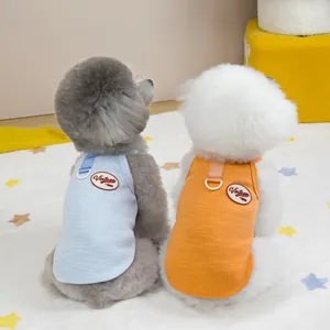 Gilets rétro pour animaux en maille gaufrée bleu clair et orange avec écussons vintage