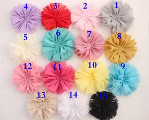 Flat lay matrix showing 15 colors of frayed chiffon flower headbands with numeric labels
