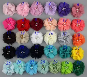 Detailed view of handmade chiffon flowers in 31 colors with pearl and rhinestone centers
