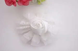 Detail of white satin rose with double-layer lace edging for baby hair accessories