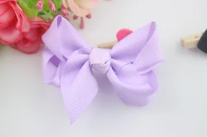 Handmade lavender grosgrain ribbon bow hairclip for girls with elegant layered texture