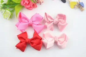 Handmade grosgrain ribbon bows in red and pink shades for kids hair accessories