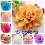 Detail of multi-layered chiffon rose pins with laser-cut eyelet petals in various colors