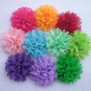 Detailed view of multi-layer chiffon fabric flowers in ten vibrant colors for DIY crafts