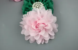 Detail of chiffon layered fabric flowers with pearls and rhinestones for hair accessories