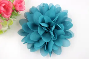 Macro detail of blue multi-layer chiffon fabric flower with fine mesh texture petals