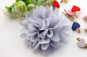 Macro detail of multilayered chiffon fabric flower for DIY hair accessories and clothing