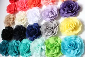 Macro shot of colorful multilayer chiffon rose flowers for DIY hair and shoe accessories