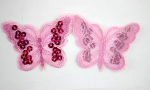Front and back detail of butterfly embroidery patches with pink sequins and mesh backing