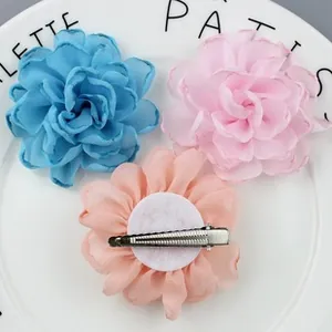 Detailed view of handmade chiffon floral hair clips with metal duckbill back clips