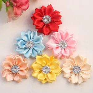 Set of six colorful handmade satin ribbon flowers with sparkling rhinestone centers