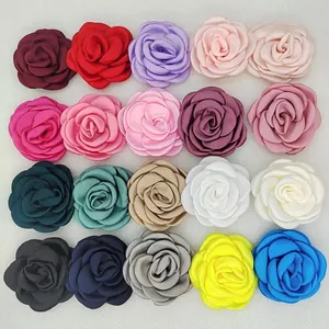 Grid display of multi-colored 6cm fabric camellia rose flowers for DIY hair accessories