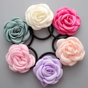 Set of 6 rose flower elastic hair ties in pastel colors like ivory and lavender