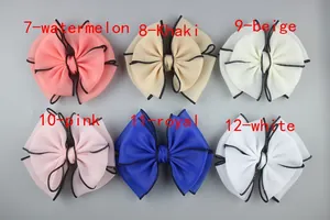 Set of large chiffon bow hair accessories in six assorted candy colors with black trim