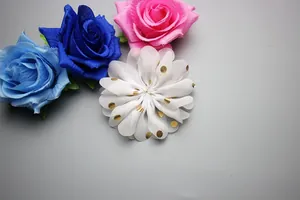 Detailed close-up of 8cm chiffon flowers with gold polka dots and fabric roses for DIY crafts