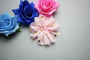 Detail of 8cm chiffon flowers with gold polka dots and fabric roses for DIY crafts