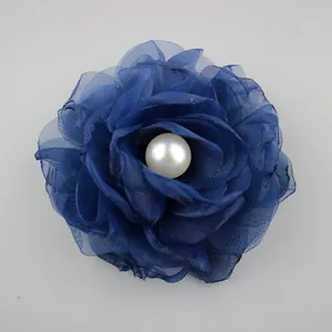 Detail of 8cm navy blue handmade burnt edge mesh flower with white pearl center