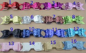 Set of 16 glitter hair bow accessories in various colors and star patterns for DIY crafts