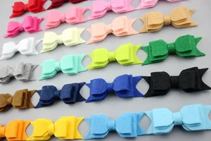 Detail view of colorful double-layered non-woven felt bow accessories for DIY hair clips
