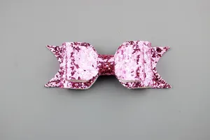 Macro detail of high-grade pink glitter bow for children accessories DIY hair decor