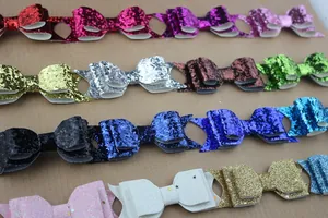 Multiple colors of glitter bow accessories for DIY hair clips and clothing decor