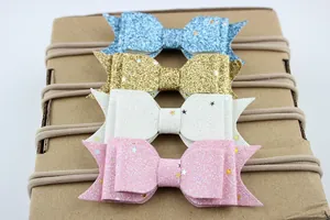 Set van 4 glitter baby haarbanden met sterpatroon strikken in blauw, goud, wit en roze