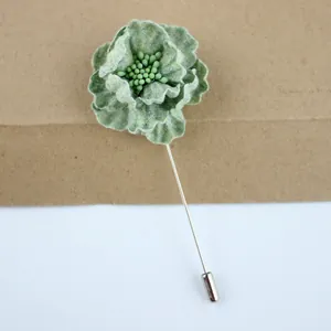 Elegant light green fabric flower brooch with multi-layered petals and silver long pin