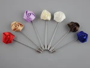 Set of seven handmade satin rose lapel pins in various colors for elegant men suits