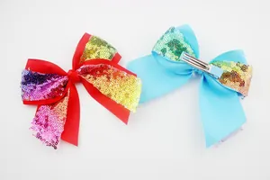 Glitter sequin bow hair clips for girls featuring red and blue gradient ribbon styles