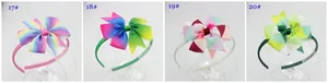 Détail de quatre serre-têtes à nœud arc-en-ciel pour filles avec motifs dégradés variés